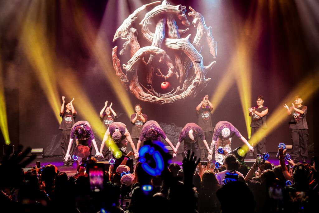 SB19 taking a bow together at the end of their LA show.