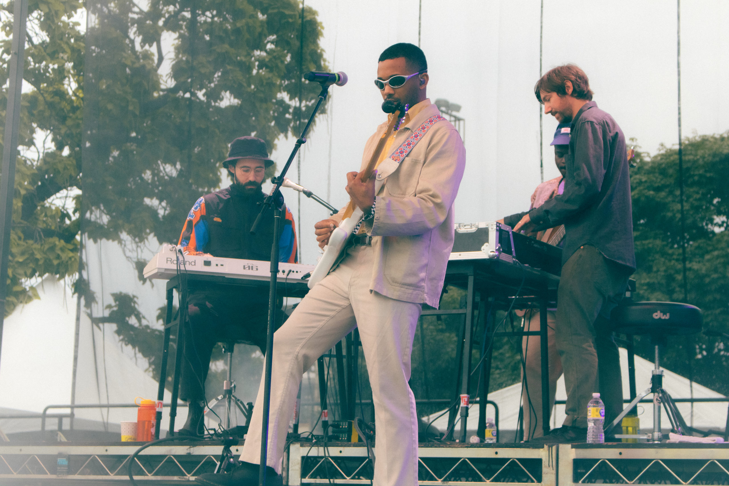 Left and right pictures: Toro y Moi performing at the 2022 Pitchfork Music Festival.