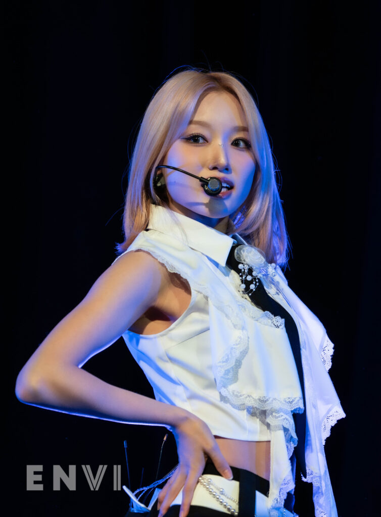 Gowon poses for fans while holding her right hand on her hips. 