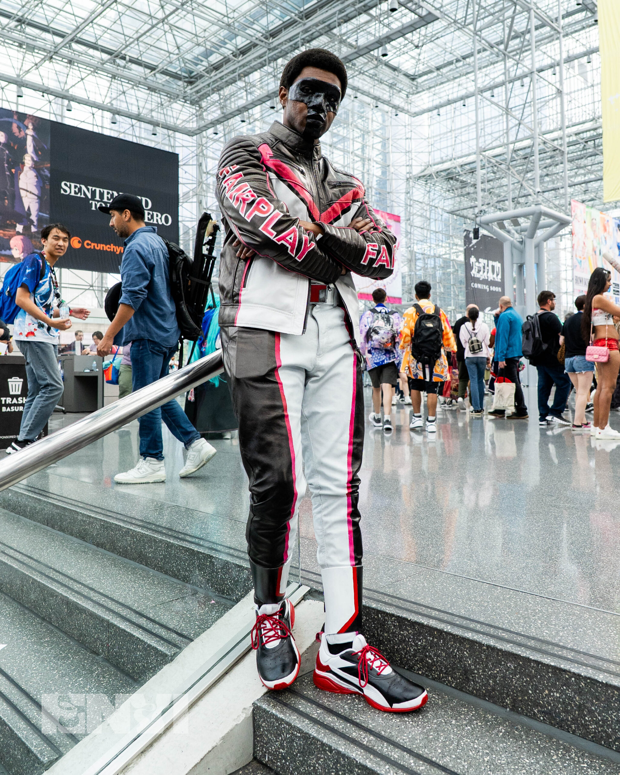 Cosplayer RJ Hooks dressed up as Mr. Terrific from DC Comics.