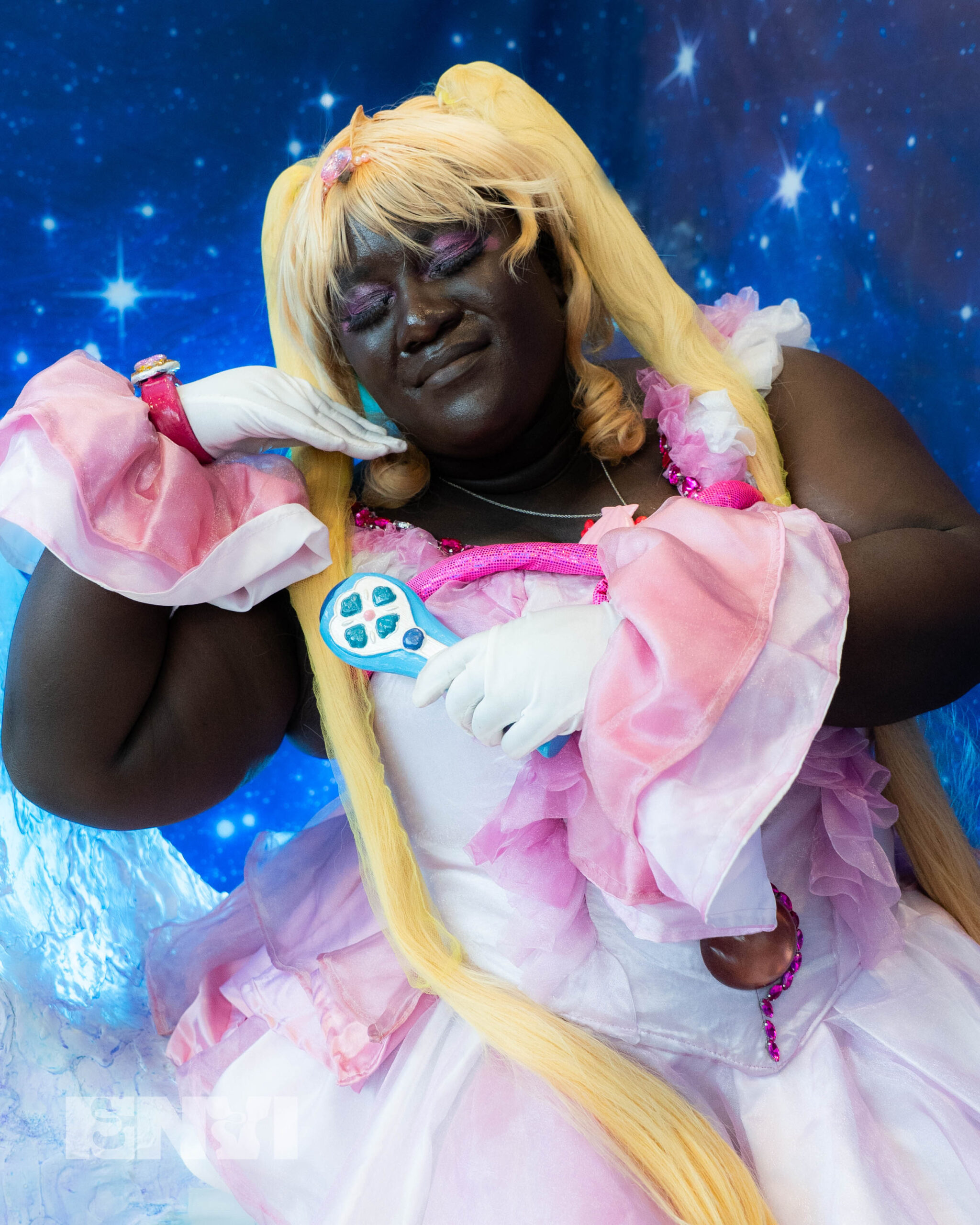 Cosplayer Stardust Megu in a cosplay of Lucia from Mermaid Melody Pichi Pichi Pichi.